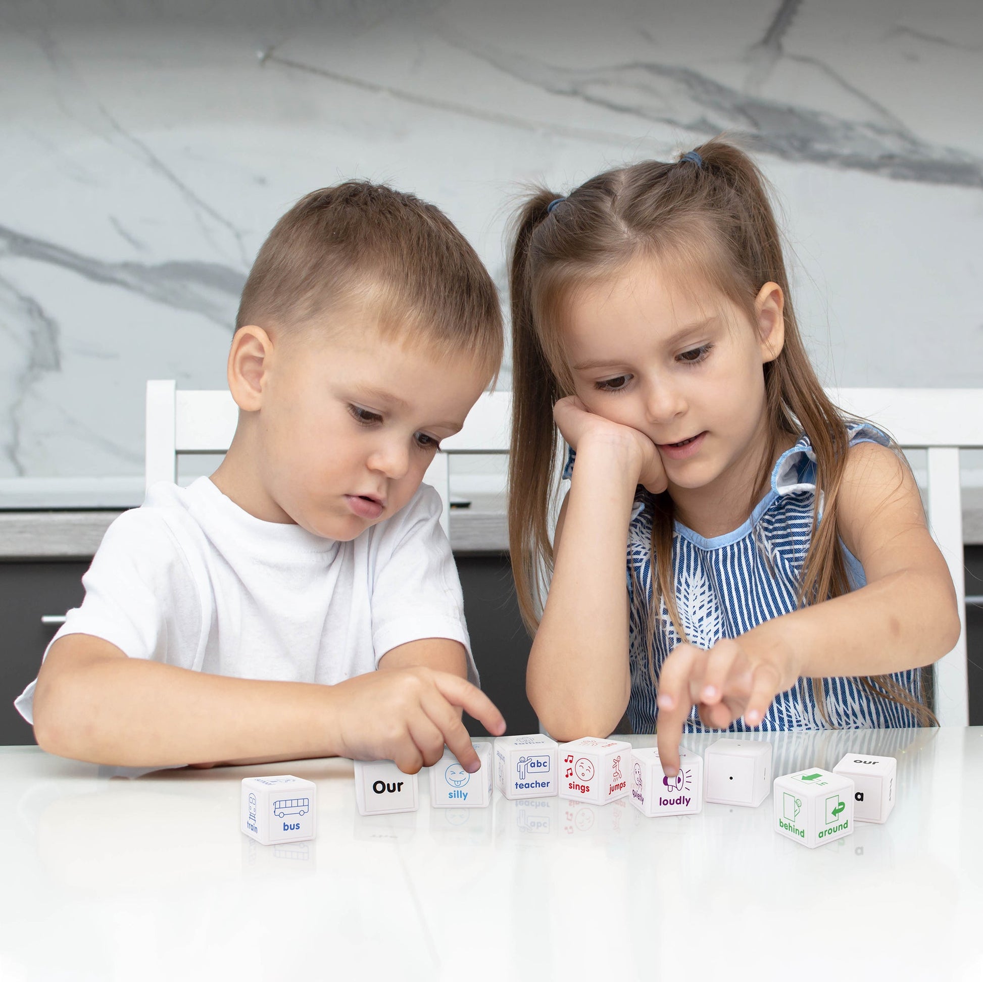Children playing with Sentence Cubes